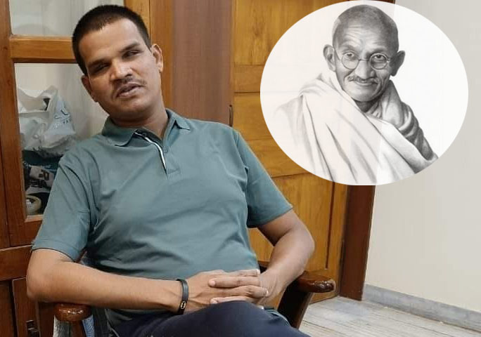 Blind teacher beats all odds, earns PhD on Mahatma Gandhi